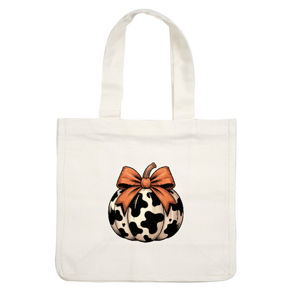 A whimsical black-and-white cow-patterned pumpkin adorned with a vibrant orange bow.DTF Transfers