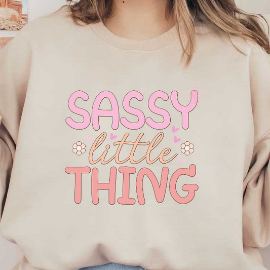 "Sassy Little Thing" features playful, pastel lettering adorned with cute hearts and flowers, perfect for a fun and vibrant aesthetic.DTF Transfers