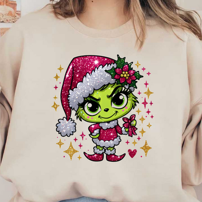 A playful green character in a sparkling pink Santa outfit, complete with a festive hat and holly, holding a gift.DTF Transfers heat press transfers