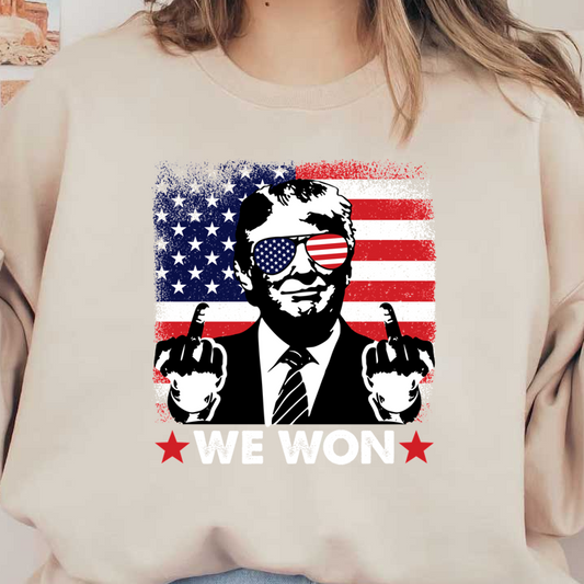 A bold graphic featuring a figure with American flag sunglasses, giving a rebellious gesture against a patriotic background, captioned "WE WON".DTF Transfersdtf regular irondtf regular iron