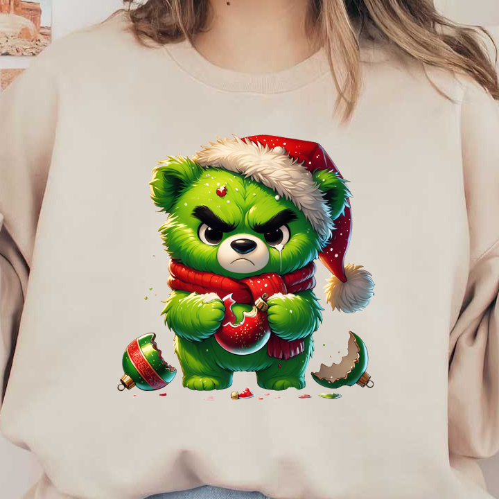 A grumpy green bear in a Santa hat and red scarf clutches a broken ornament, surrounded by fragments of holiday decor.DTF Transfers dtf prints