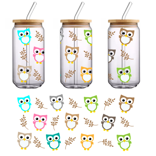 A colorful collage of adorable, cartoon-style owls in various shades, accompanied by stylized autumn leaves.UV Transfers heat press transfers