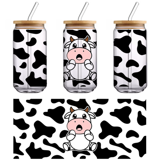 A cheerful cartoon cow with brown horns and a surprised expression, perfect for playful designs or children’s themes.UV Transfers dtf transfers