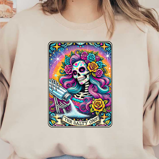 A vibrant, Day of the Dead-inspired illustration featuring a colorful skull with flowers, sprinkling salt, titled "The Salty One." heat press transfers