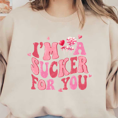 Playful and colorful, this graphic features the phrase "I'm a sucker for you" adorned with hearts and lollipops, perfect for sweet sentiments.DTF Transfers