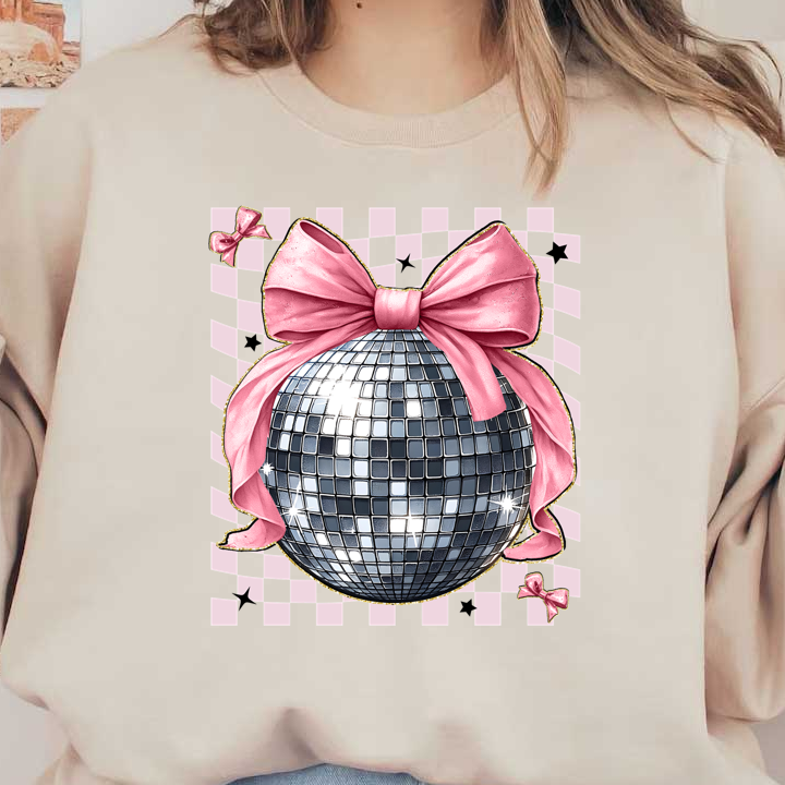 A sparkling disco ball adorned with a vibrant pink bow, perfect for adding a festive touch to any party atmosphere.DTF Transfers dtf transfers dtf transfers