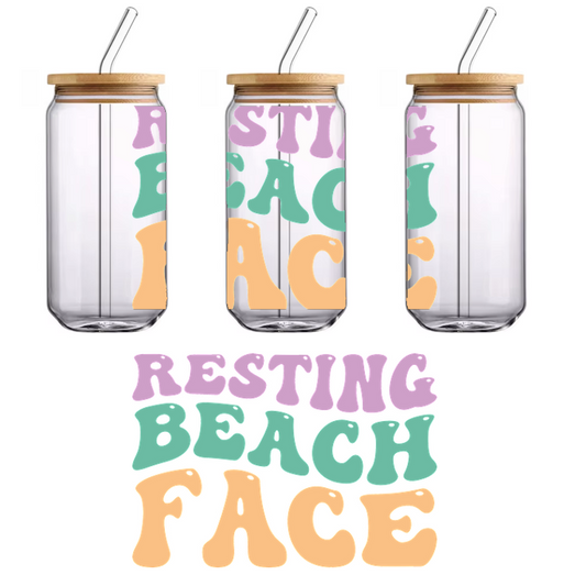 Playful and colorful typography that says "Resting Beach Face," perfect for a fun beach-themed vibe!UV Transfers dtf transfers