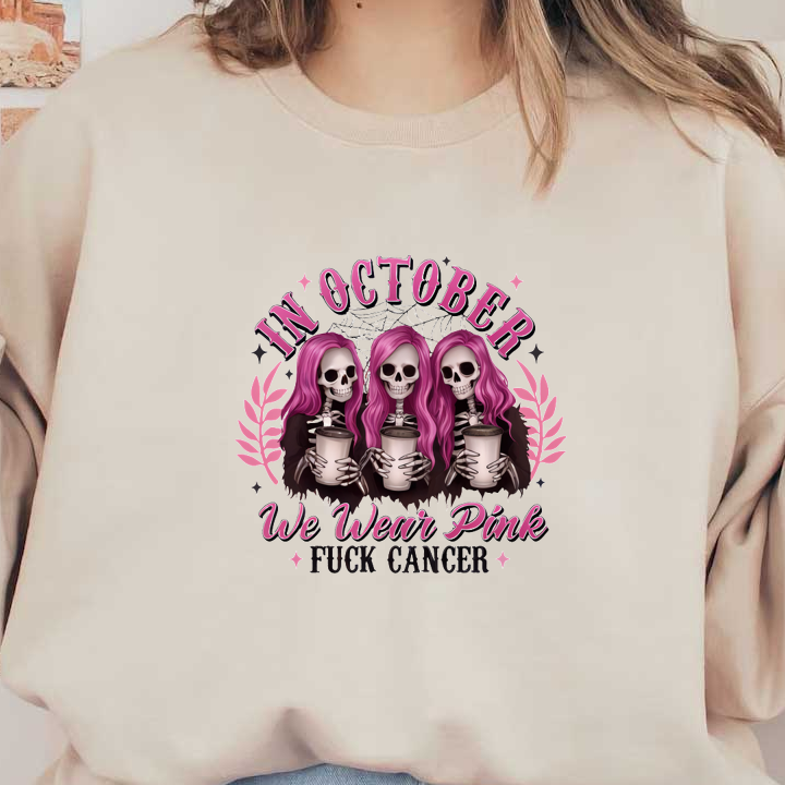 A vibrant graphic featuring three pink-haired skeletons holding drinks, promoting breast cancer awareness with the slogan "We Wear Pink, Fuck Cancer" for October.DTF Transfers dtf transfers