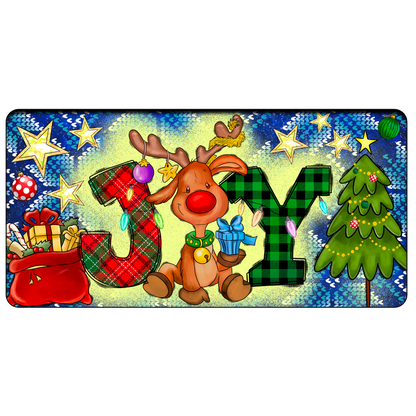 A cheerful holiday scene featuring a cute reindeer, colorful letters spelling "JOY," gifts, and a decorated Christmas tree.DTF Transfers dtf prints