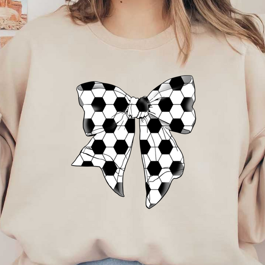 Un lazo elegante que presenta un patrón hexagonal en blanco y negro, que recuerda al diseño clásico de un balón de fútbol.