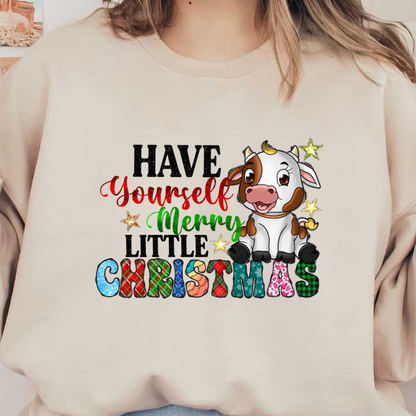 A cheerful cartoon cow celebrates the festive season with the playful text "Yourself Merry Christmas" in vibrant, festive colors.DTF Transfers heat press transfers dtf transfers