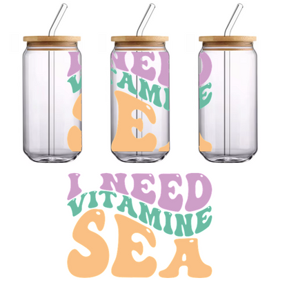 A fun, colorful design featuring the playful phrase "I Need Vitamin Sea," perfect for beach lovers and summer vibes.UV Transfersdtf regular iron