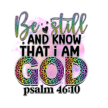 A vibrant design featuring the inspirational quote "Be still and know that I am God" from Psalm 46:10, enhanced with colorful, leopard-print letters.DTF Transfers