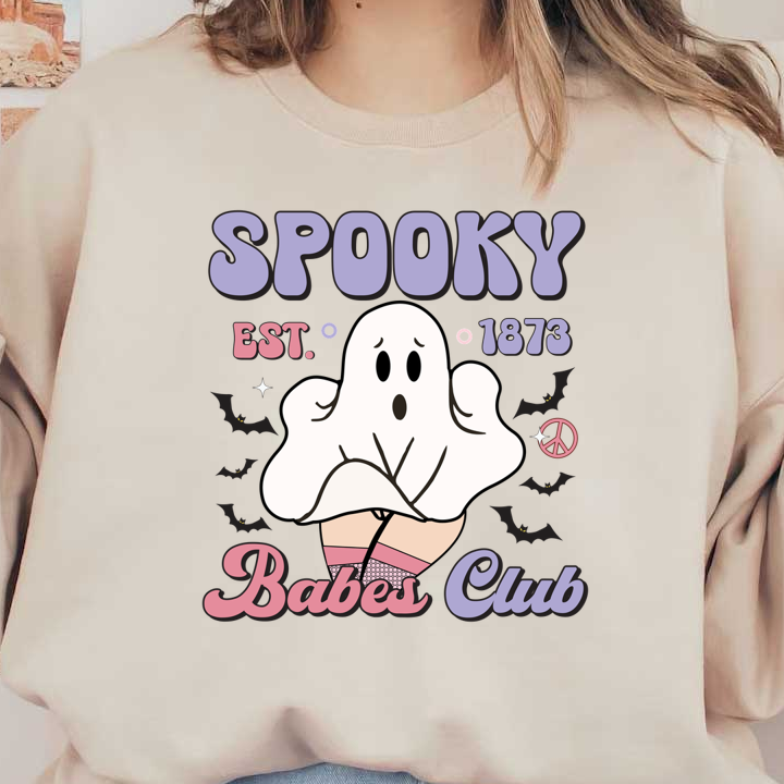 A playful design featuring a cartoon ghost, with the text "Spooky Babes Club" and a vintage date of 1873.dtf regular iron