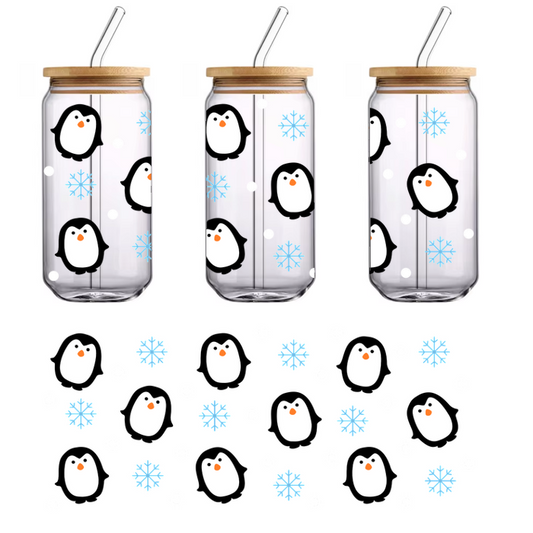 A playful winter-themed pattern featuring cute penguins, snowflakes, and snowballs against a black background.UV Transfers heat press transfers