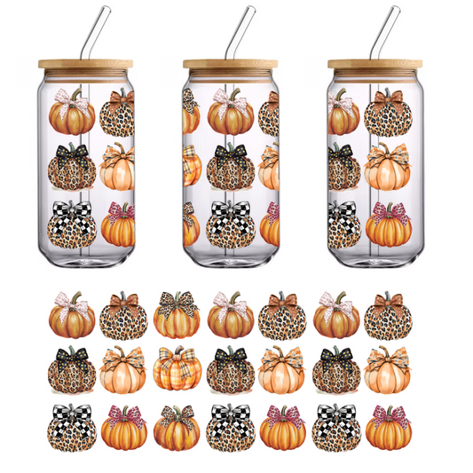 A colorful collection of decorative pumpkins featuring various patterns and bows, perfect for autumn decor.UV Transfersdtf regular iron