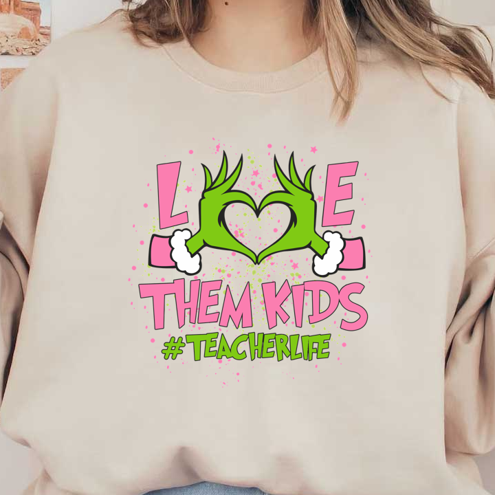 A vibrant and playful graphic celebrating teachers with the phrase "Love Them Kids" and a heart shape formed by hands.DTF Transfers dtf prints