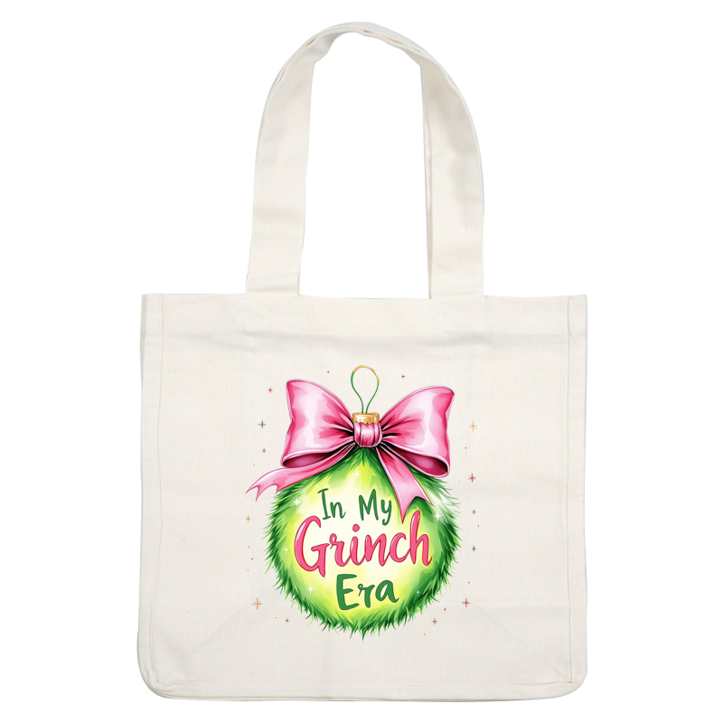 Festive and playful, this vibrant green ornament features the phrase "In My Grinch Era," topped with a pink bow.DTF Transfers