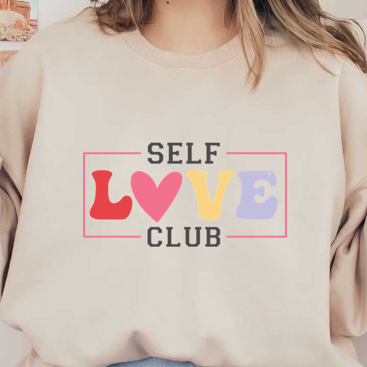 A vibrant logo for the "Self Love Club," featuring playful lettering and a heart symbol to promote self-acceptance. heat press transfers