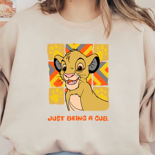 A cheerful cartoon cub with a playful expression, surrounded by vibrant patterns, captures the essence of youth with the caption "Just being a cub." dtf transfers heat press transfers