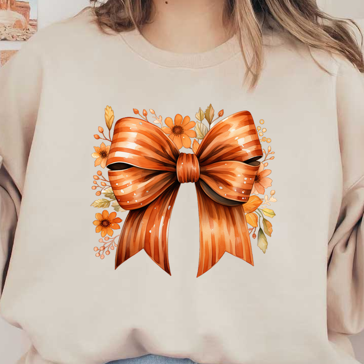 A vibrant orange ribbon bow adorned with floral accents, perfect for adding a cheerful touch to gifts or decorations. dtf prints